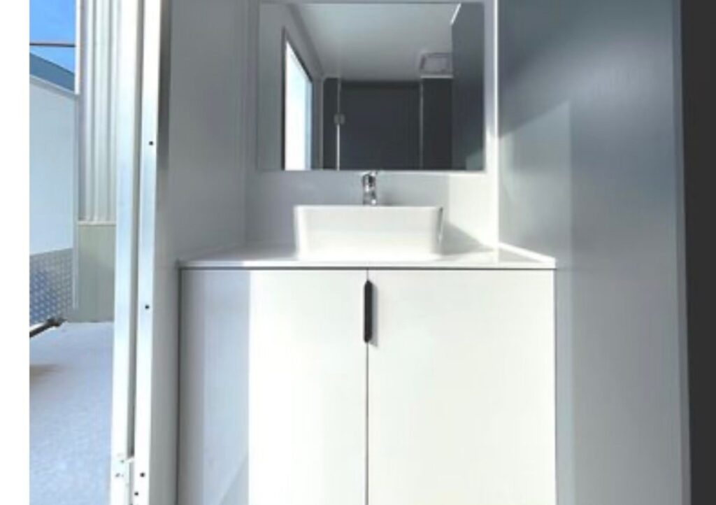Luxury bathroom trailer rentals in St. Marys, GA by Amelia Island Restroom Rentals. Perfect for weddings, events, and construction. Call 904-816-3454 to book now!