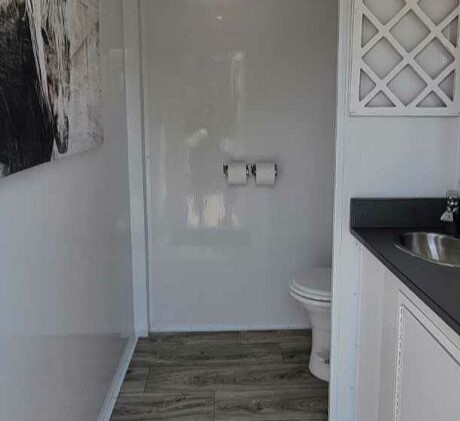 Luxury bathroom trailer rentals in Yulee by Amelia Island Restroom Rentals. Modern amenities for events and job sites. Call 904-816-3454 to book now!